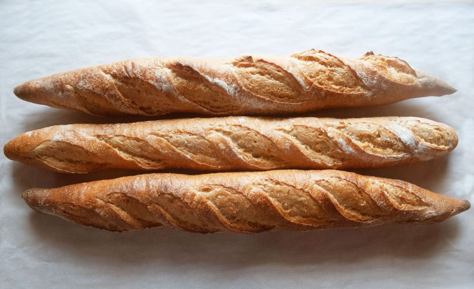 Why are bread, pasta, and other flour products easier to digest in Europe?